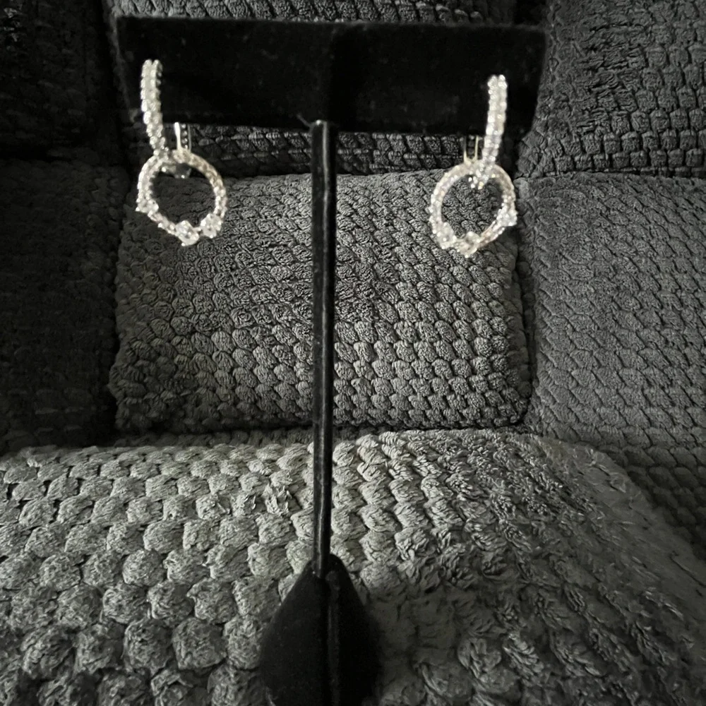 Elegant Silver Hoop Earrings - Picture 2 of 3